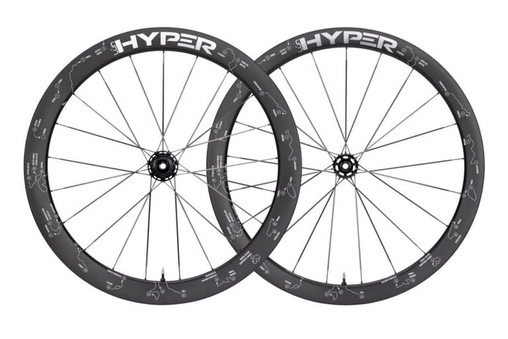 Lún HYPER D45 disc brake carbon wheelset with 45mm deep rims, matte black with white track graphics and HYPER logo.