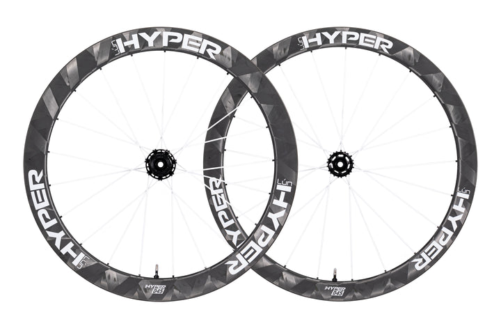 Lún HYPER D45 disc brake carbon wheelset, matte black rims, white HYPER branding, deep profile with white carbon spokes.