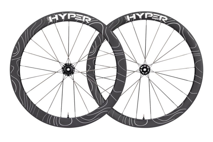 Lún HYPER D45 disc brake carbon wheelset, matte black rims with white F-RAPID design, 'HYPER' branding, product showcase.