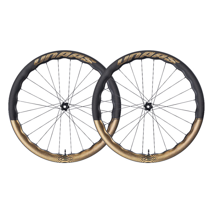 UNAAS HARD2 D50 disc brake wheelset with matte carbon rims and gold accent band.