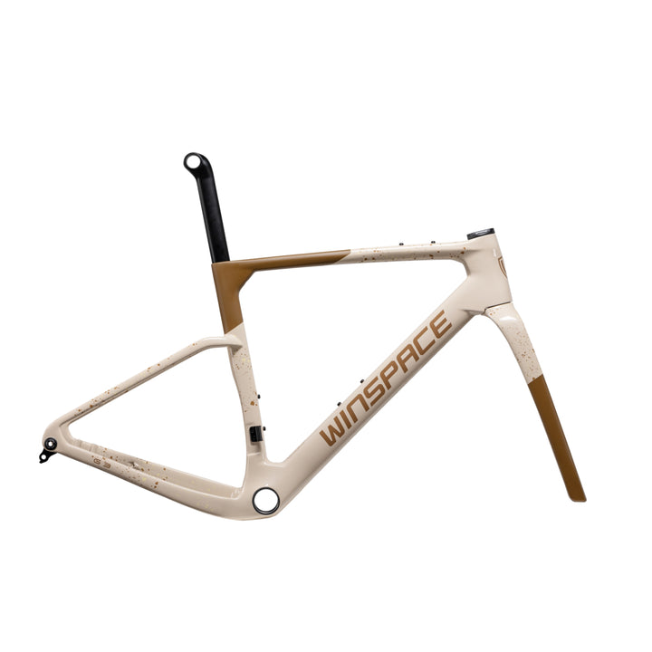 WINSPACE G3 gravel bike frameset, matte cream with brown speckled accents and metallic brown WINSPACE logo.