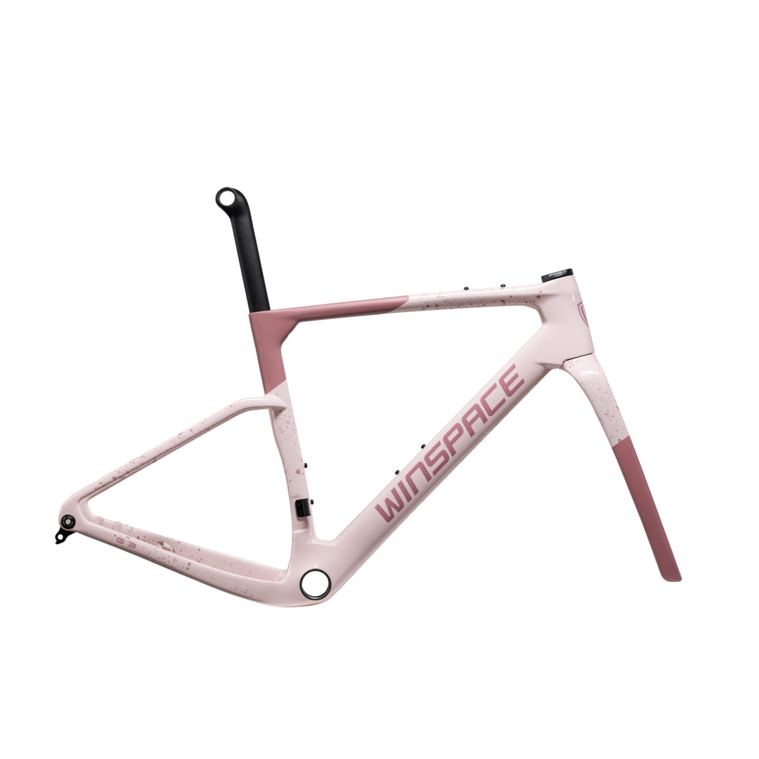 WINSPACE G3 gravel bike frameset in blush pink with darker pink speckles and branding, matte finish.