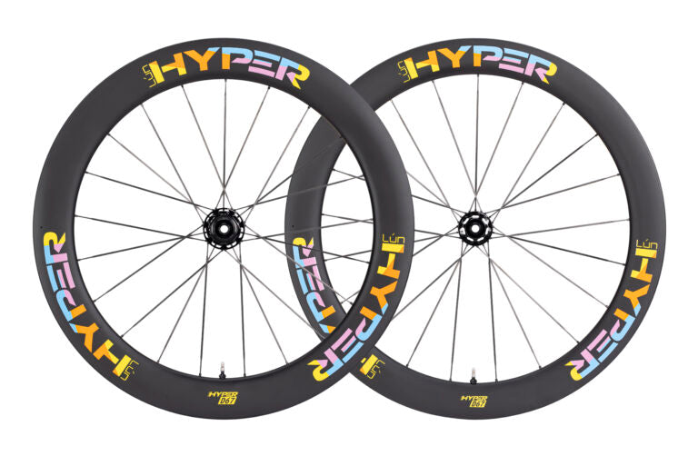 Lún HYPER D67 disc brake wheelset, 67mm deep matte carbon rims with colorful branding, black hubs and spokes.