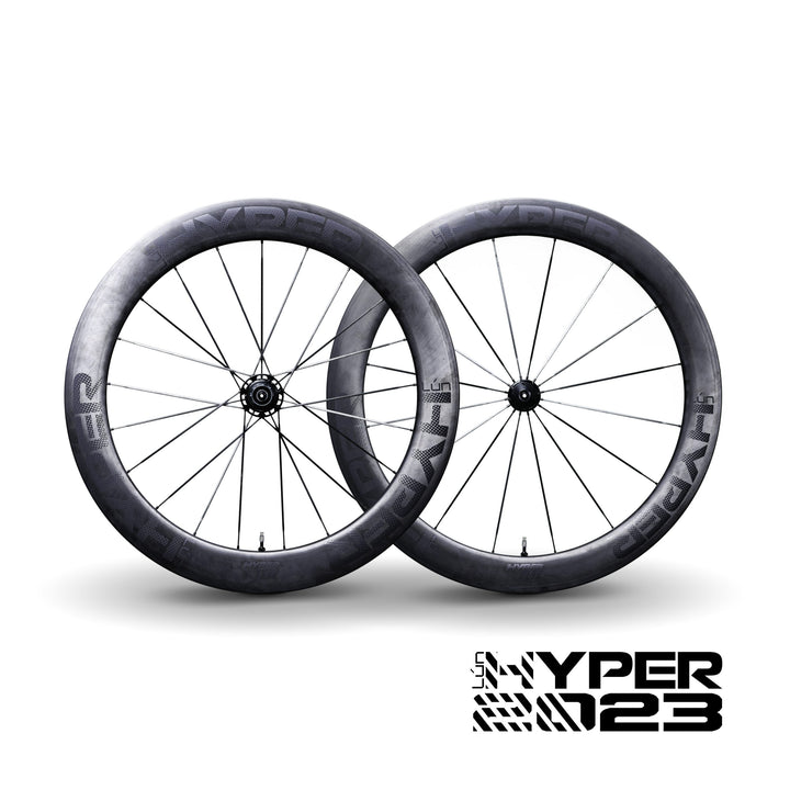 Lún HYPER R67 rim brake wheelset: dark carbon fiber rims, black spokes, and hubs.