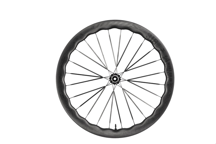 UNAAS Pro2 carbon bicycle wheel with distinctive wave rim, 'ROUTE 318' branding and altitude markers.