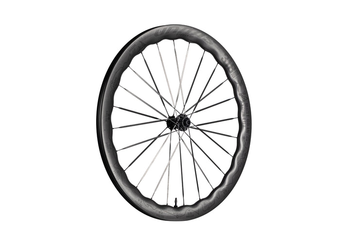 UNAAS Pro2 carbon bicycle wheel with unique wave rim, black spokes and hub on white background. Product appearance.