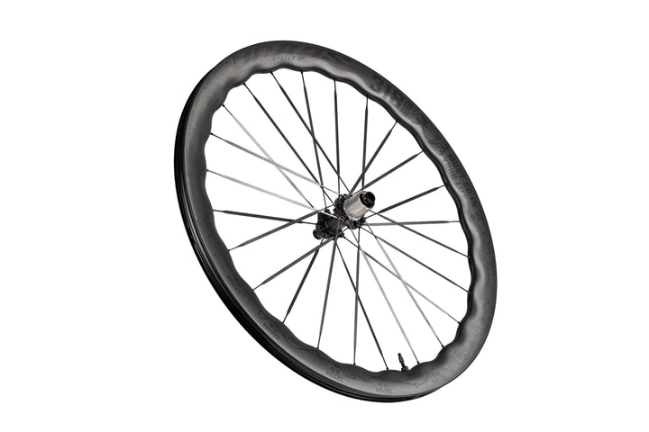 Single UNAAS Pro2 carbon bicycle wheel, wavy rim with 'ROUTE 318' branding, mixed spokes, silver hub.