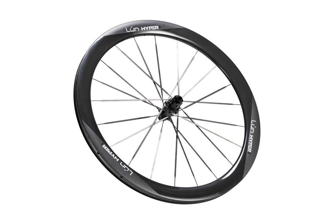 Semi-gloss black carbon fiber LUN HYPER 5 bicycle wheel with bladed spokes and deep-section rim.