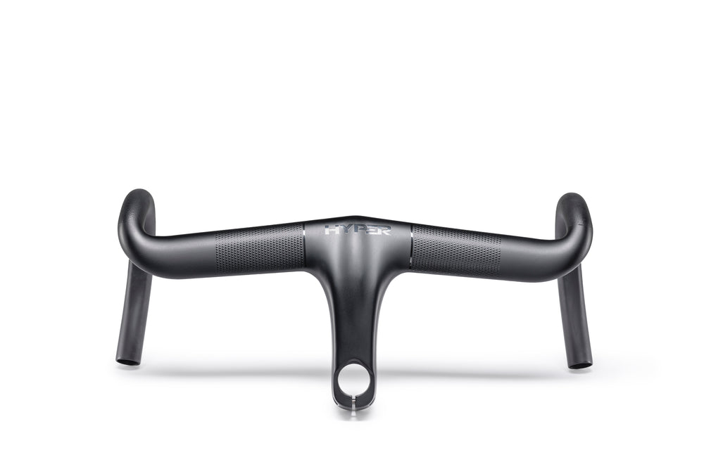 Matte black carbon fiber HYPER integrated bicycle handlebar with textured grip and drop bar shape.