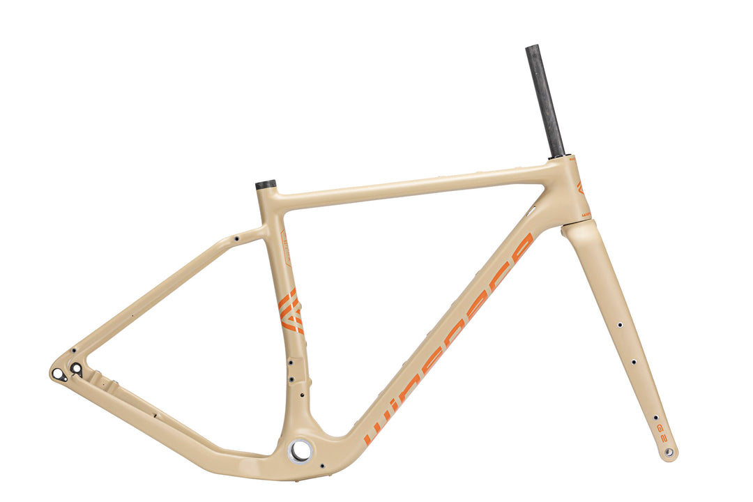 Beige carbon fiber Winspace G2 Gravel bike frame and fork set with orange branding, showcasing design and components.