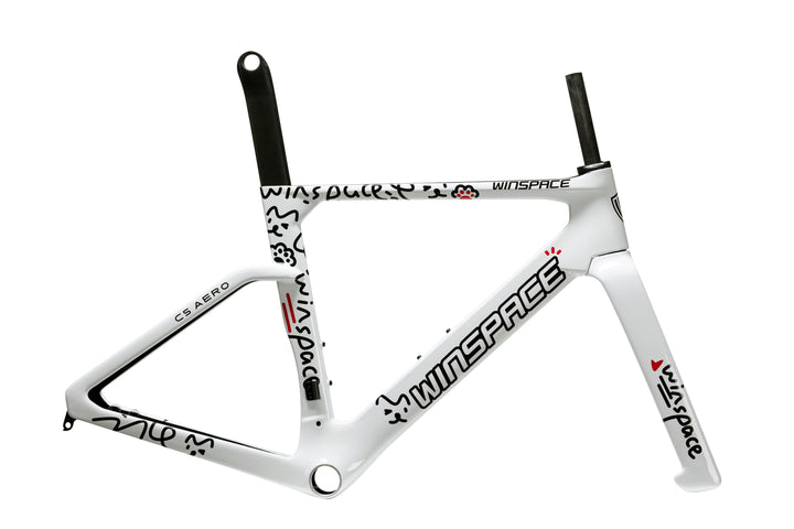 White Winspace C5 Aero road bike frame with black doodle graphics and red accents, showcasing aerodynamic design.