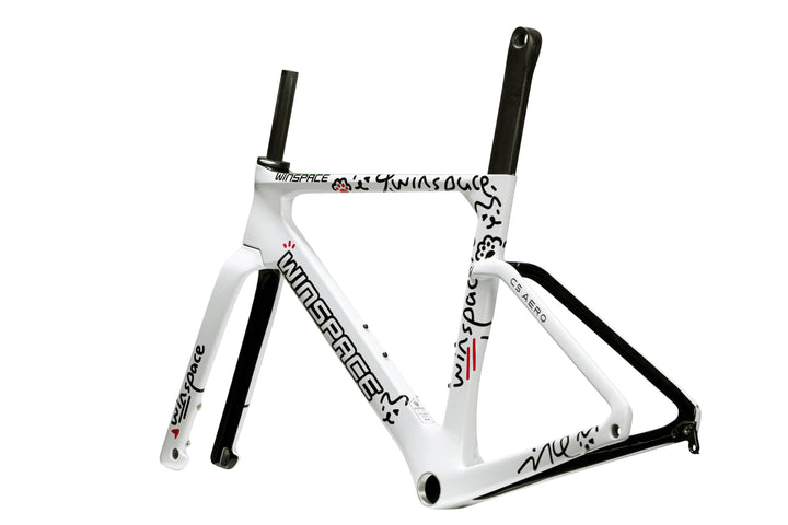 White Winspace C5 Aero carbon frame with black doodles, red accents, and WINSPACE branding. Aerodynamic.