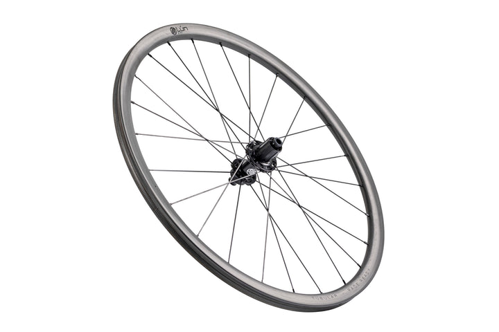 Lún Road TD30 tubular disc brake wheel, 30mm grey carbon rim with black spokes and 'TUBULAR & RACE READY' text.