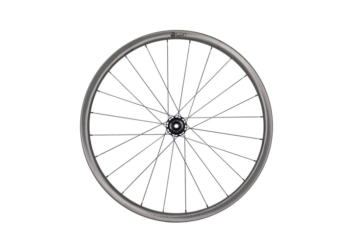 Lún Road TD30 tubular disc brake road bike wheel with 30mm grey carbon rim and black spokes on white background.