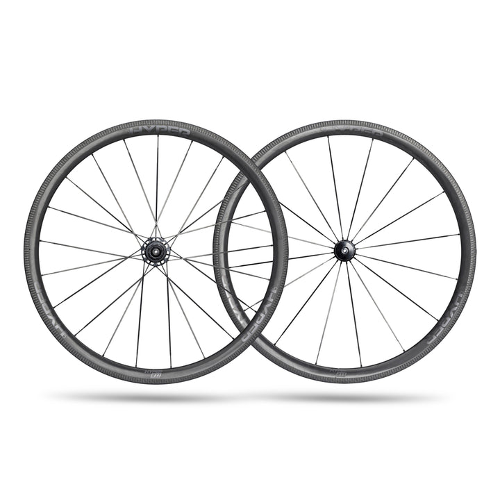 Lún HYPER 23 SE R33 carbon fiber rim brake wheelset with matte black UD finish and textured braking surface.