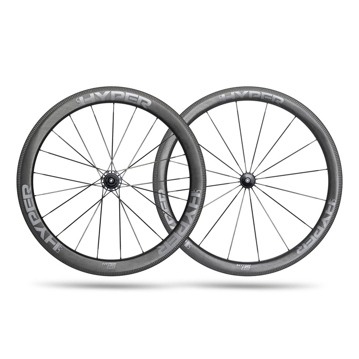 Lún HYPER 23 SE R45 rim brake wheelset, matte UD carbon finish with grey logos and carbon spokes, front wheel angled.