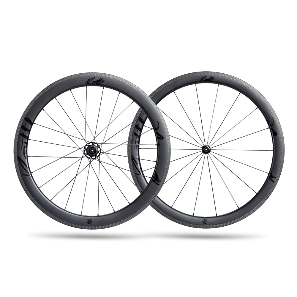 Lún Routte SE carbon fiber rim brake wheelset: 46mm front, 54mm rear, matte grey, with black Lún Routte branding.