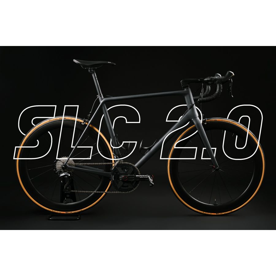 Matte black WINSPACE SLC 2.0 road bike with tan wall tires and gloss deep-section wheels, showcasing modern design.