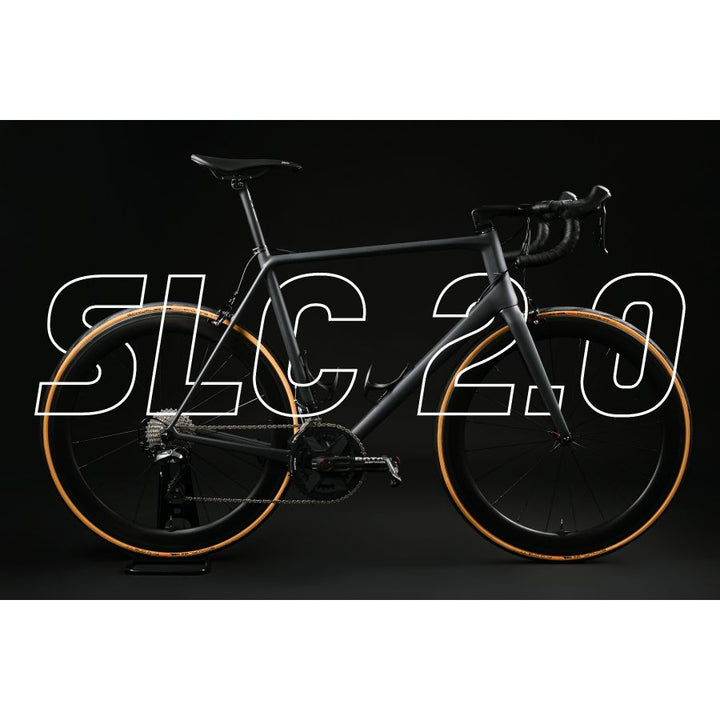 Matte black WINSPACE SLC 2.0 road bike with tan wall tires and gloss deep-section wheels, showcasing modern design.