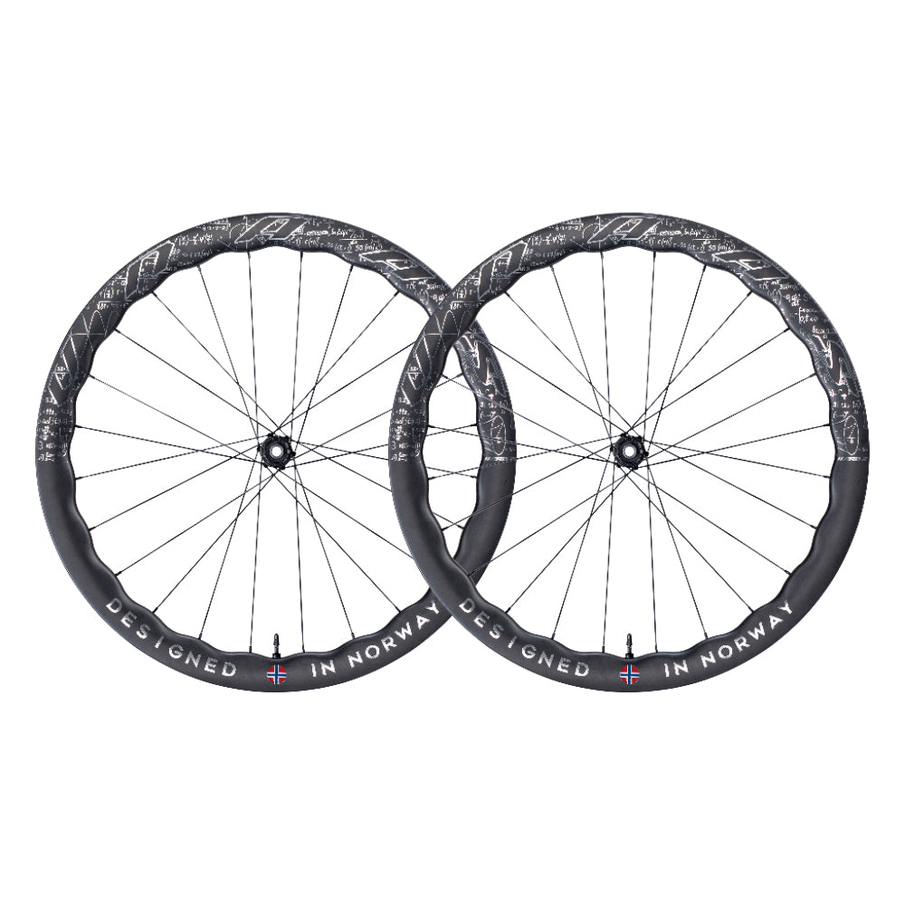 Pair of carbon fiber bicycle wheelsets, "DESIGNED IN NORWAY" text with Norwegian flag emblem.